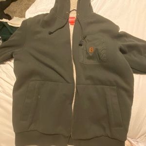 coleman tinted green zip up. size M